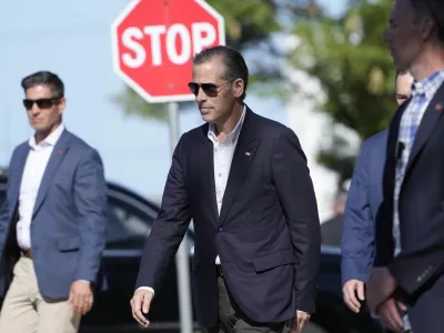 Hunter Biden, center, leaves St. Edmond Catholic Church in Rehoboth Beach, Del., Saturday, June 1, 2024. (AP Photo/Susan Walsh)