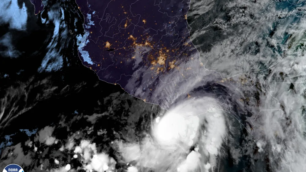 This satellite image made available by NOAA shows Hurricane Agatha off the Pacific coast of Oaxaca state, Mexico on Monday, May 30, 2022, at 8:30 a.m. EDT. (NOAA via AP)