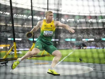 Mykolas Alekna, of Lithuania, makes an attempt in in the Men's discus throw qualification during the World Athletics Championships in Budapest, Hungary, Saturday, Aug. 19, 2023. (AP Photo/Bernat Armangue)