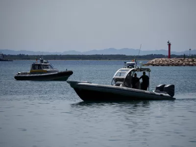 Guardia di Finanza boats are seen off shore, as Italy's Prime Minister Giorgia Meloni visits the construction sites of the migrant processing centre, off Shengjin, Albania June 5, 2024. REUTERS/Florion Goga