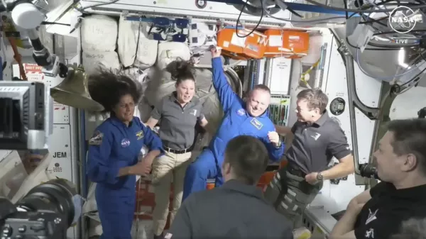 NASA astronauts Butch Wilmore and Suni Williams are greeted by the crew of the International Space Station on Thursday, June 6, 2024. (NASA via AP)