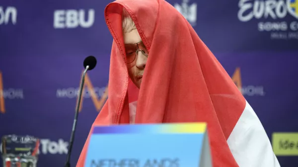 Joost Klein representing the Netherlands gestures, during a press conference after the second semi-final of the Eurovision Song Contest, at the Malmo Arena, in Malmo, Sweden, Thursday, May 9, 2024. Hours before the final, Dutch contestant Joost Klein was dramatically booted out by organizers over a backstage incident. He had failed to perform at two dress rehearsals on Friday, and contest organizer the European Broadcasting Union said it was investigating an "incident." (Jessica Gow /TT News Agency via AP)