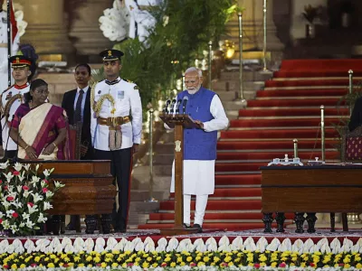 India's Prime Minister Narendra Modi takes an oath during a swearing-in ceremony at the presidential palace in New Delhi, India, June 9, 2024. REUTERS/Adnan Abidi