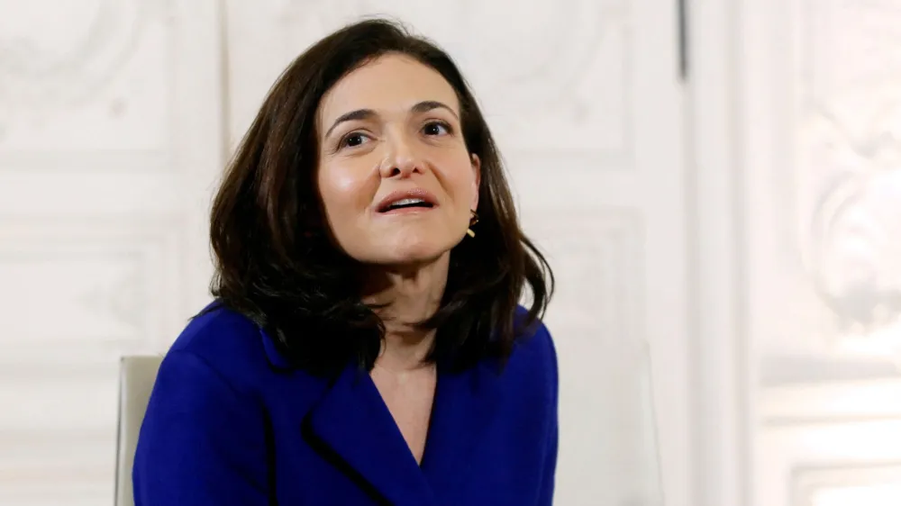 FILE PHOTO: Chief Operating Officer of Facebook, Sheryl Sandberg, attends the "Choose France" summit at the Chateau de Versailles, near Paris, January 22, 2018. REUTERS/Thibault Camus/Pool//File Photo