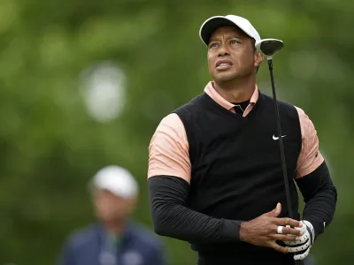 Tiger Woods watches his tee shot on the 17th hole during the third round of the PGA Championship golf tournament at Southern Hills Country Club, Saturday, May 21, 2022, in Tulsa, Okla. (AP Photo/Eric Gay)