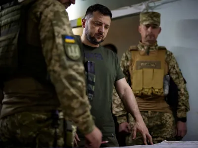 FILE PHOTO: Ukraine's President Volodymyr Zelenskiy visits a position of Ukrainian service members, as Russia's attack on Ukraine continues, in Soledar, Donetsk region, Ukraine June 5, 2022. Picture taken June 5, 2022. Ukrainian Presidential Press Service/Handout via REUTERS ATTENTION EDITORS - THIS IMAGE HAS BEEN SUPPLIED BY A THIRD PARTY./File Photo