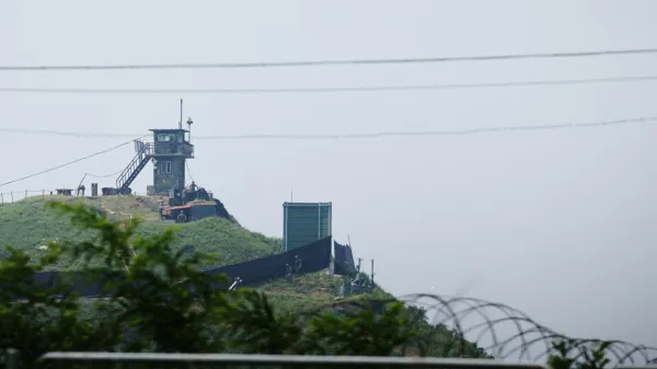 South Korean soldiers walk past a military facility (Green box) where loudspeakers dismantled in 2018 used to be, near the demilitarized zone separating the two Koreas in Paju, South Korea, June 10, 2024.  REUTERS/Kim Hong-Ji