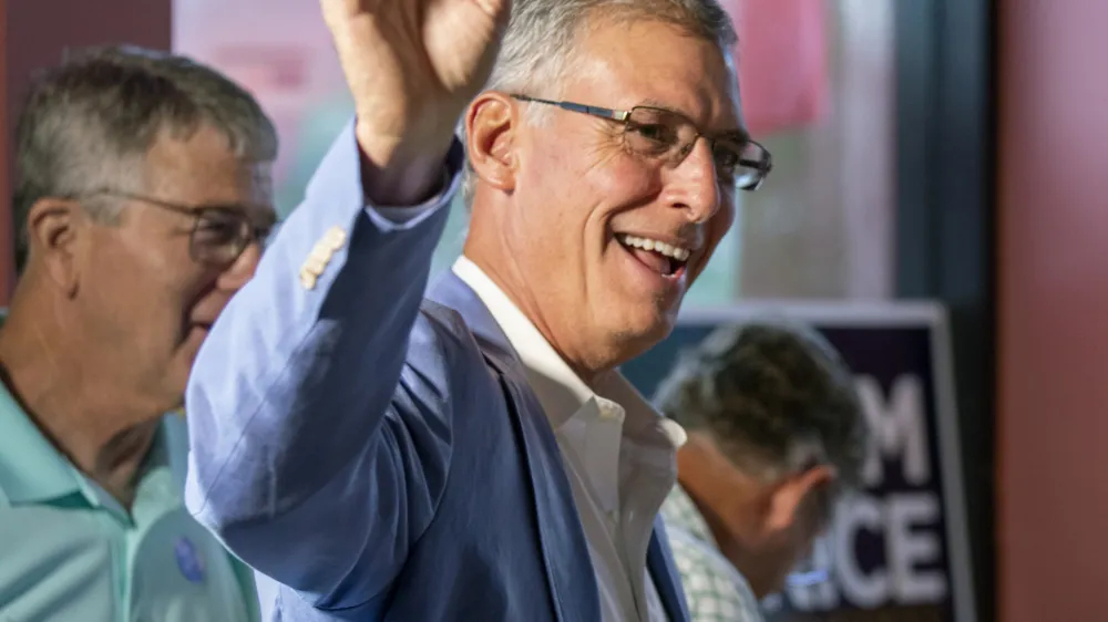 South Carolina Rep. Tom Rice greets supporters at Brother's Grill in Myrtle Beach, S.C., as he waits for primary election results to come in, Tuesday, June 14, 2022. (Jason Lee/The Sun News via AP)