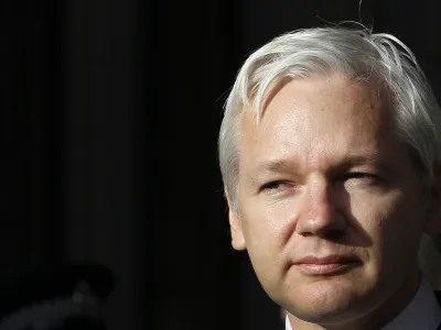 FILE - WikiLeaks founder Julian Assange pauses as he makes a statement to media gathered outside the High Court in London, on Monday, Dec. 5, 2011. The British government on Friday, June 17, 2022 ordered the extradition of WikiLeaks founder Julian Assange to the United States to face spying charges. He is likely to appeal. (AP Photo/Kirsty Wigglesworth, File)