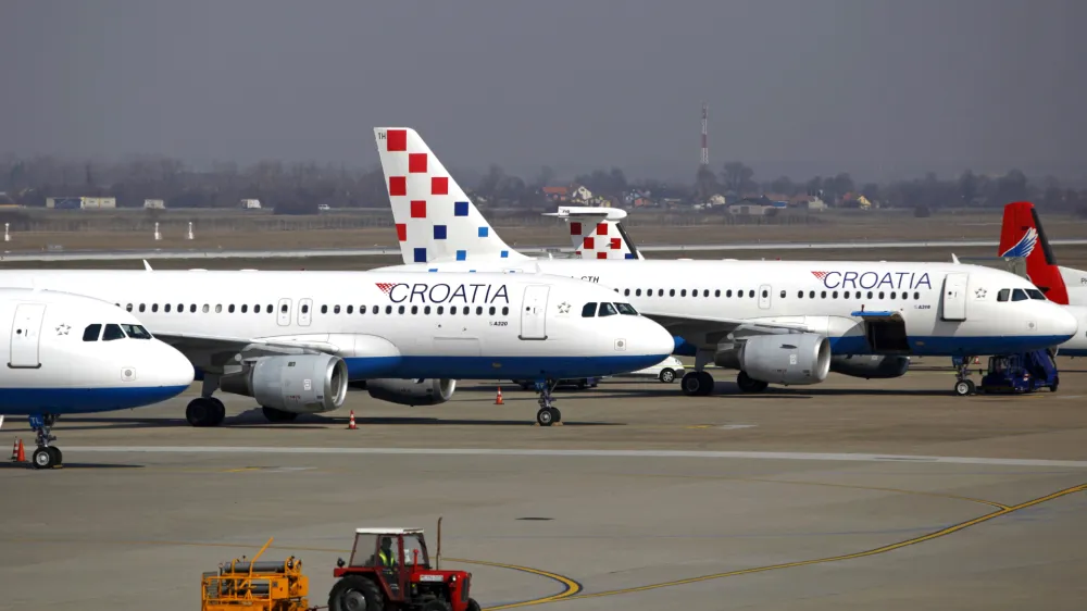 Croatia Airlines aircraft are seen on the tarmac during a strike by employees at Pleso international airport in Zagreb March 8, 2012. The 24-hour strike, in protest over financial losses and the possible loss of rights and entitlements, forced the cancellation of half of all the carrier's scheduled flights. REUTERS/Antonio Bronic (CROATIA - Tags: TRANSPORT BUSINESS EMPLOYMENT)