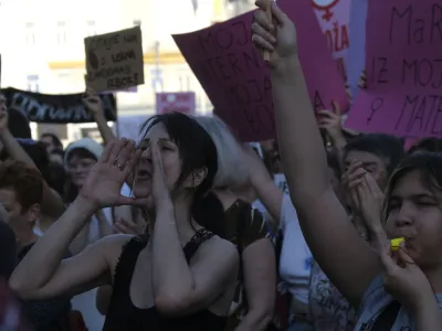 People attend a protest in solidarity with a woman who was denied an abortion despite her fetus having serious health problems, in Zagreb, Croatia, Thursday, May 12, 2022. The case has sparked public outrage and rekindled a years-long debate about abortion in Croatia, a member of the European Union. (AP Photo)