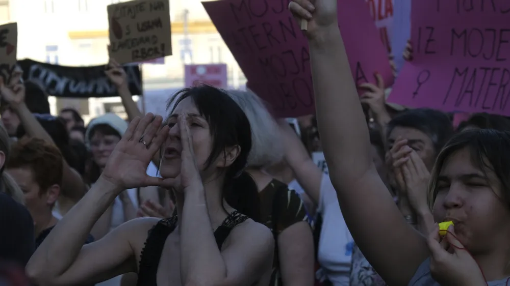 People attend a protest in solidarity with a woman who was denied an abortion despite her fetus having serious health problems, in Zagreb, Croatia, Thursday, May 12, 2022. The case has sparked public outrage and rekindled a years-long debate about abortion in Croatia, a member of the European Union. (AP Photo)