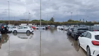 Vehicles parked in a flooded car park after heavy rains, at Palma de Mallorca airport, in Palma de Mallorca, Spain June 11, 2024, in this picture obtained from social media. Carmen Estaban Sanchez/via REUTERS THIS IMAGE HAS BEEN SUPPLIED BY A THIRD PARTY. MANDATORY CREDIT. NO RESALES. NO ARCHIVES.