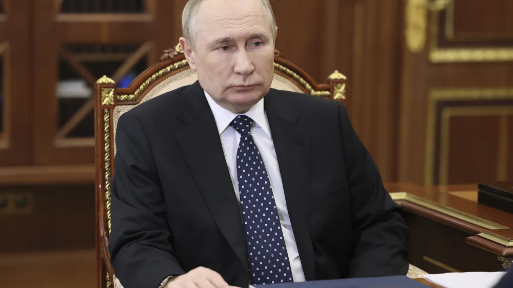 Russian President Vladimir Putin attends a meeting in Moscow, Russia, Thursday, Jan. 5, 2023. (Mikhail Klimentyev, Sputnik, Kremlin Pool Photo via AP)