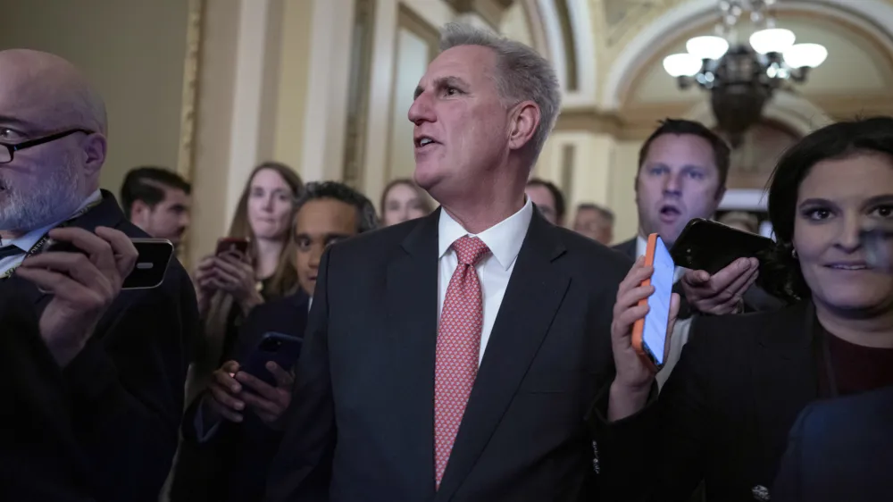 Rep. Kevin McCarthy, R-Calif., leaves the House floor after the House voted to adjourn for the evening as the House met for a third day to try to elect a speaker and convene the 118th Congress on Capitol Hill in Washington, Thursday, Jan. 5, 2023. (AP Photo/J. Scott Applewhite)