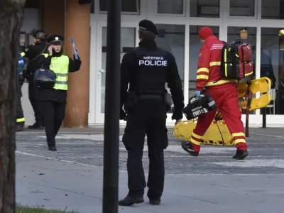 ﻿Police personnel and paramedics outside the Ostrava Teaching Hospital after a shooting incident in Ostava, Czech Republic, Tuesday, Dec. 10, 2019. Police and officials say at least four people have been killed in a shooting in a hospital in the eastern Czech Republic. Two others are seriously injured. (Jaroslav Ozana/CTK via AP)