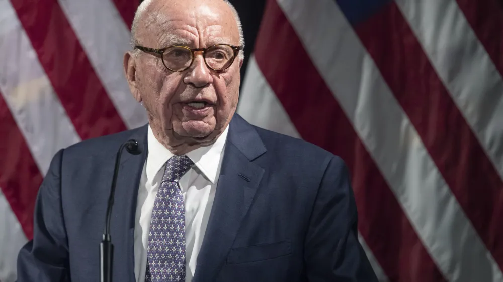 FILE - Rupert Murdoch introduces Secretary of State Mike Pompeo during the Herman Kahn Award Gala, Oct. 30, 2019, in New York. Murdoch, chairman of Fox Corp., acknowledged in a deposition that some Fox News commentators endorsed the false allegations by former President Donald Trump and his allies that the 2020 presidential election was stolen and that he did not step in to stop them from promoting the claims. The documents unsealed Monday, Feb. 27, 2023, are at the heart of a defamation lawsuit against the cable news giant by Dominion Voting Systems. (AP Photo/Mary Altaffer, File)