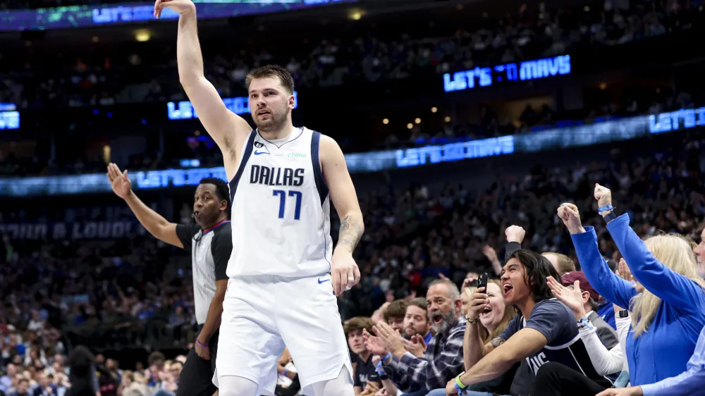 Mar 7, 2023; Dallas, Texas, USA; Dallas Mavericks guard Luka Doncic (77) reacts after scoring during the third quarter against the Utah Jazz at American Airlines Center. Mandatory Credit: Kevin Jairaj-USA TODAY Sports