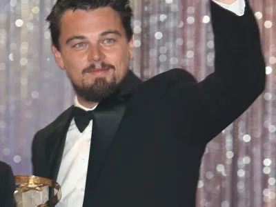 **FILE** American actor Leonardo Di Caprio gestures after receiving an award for his lifetime career during the opening of the seventh Marrakesh Film Festival, in this Dec. 7, 2007, file photo, in Marrakesh, Morocco. DiCaprio's neighbors will have to show more proof if they want to sue him for building a basketball court they claim destabilized their California property, a judge ruled. For the second time in three months, the judge said Thursday, Jan. 3, 2008, the complaint seeking at least 0,000 (euro169,457) in damages is not complete enough to go forward.  (AP Photo/Abdeljalil Bounhar, file)