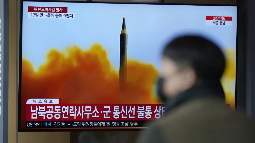 A TV screen is seen reporting North Korea's missile launch with file footage during a news program at the Seoul Railway Station in Seoul, South Korea, Thursday, April 13, 2023. North Korea launched a ballistic missile that landed in the waters between the Korean Peninsula and Japan on Thursday, prompting Japan to order residents on an island to take shelter as a precaution. The order has been lifted. (AP Photo/Lee Jin-man)