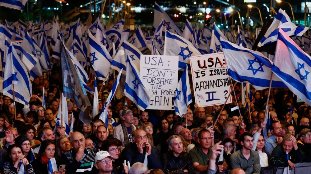 People take part in a demonstration against Israeli Prime Minister Benjamin Netanyahu and his nationalist coalition government's judicial overhaul, in Tel Aviv, Israel April 29, 2023. REUTERS/Corinna Kern