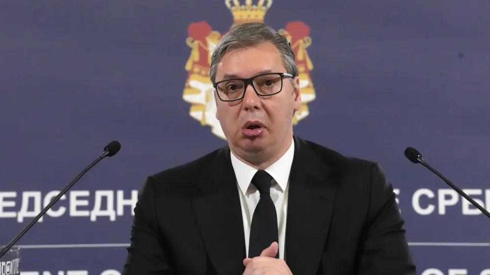 Serbian President Aleksandar Vucic addresses media after shooting in Ribnikar school in Belgrade, Serbia, Wednesday, May 3, 2023. Police say a 13-year-old who opened fire at his school drew sketches of classrooms and made a list of people he intended to target. He killed eight fellow students and a school guard before being arrested Wednesday. (AP Photo/Darko Vojinovic)