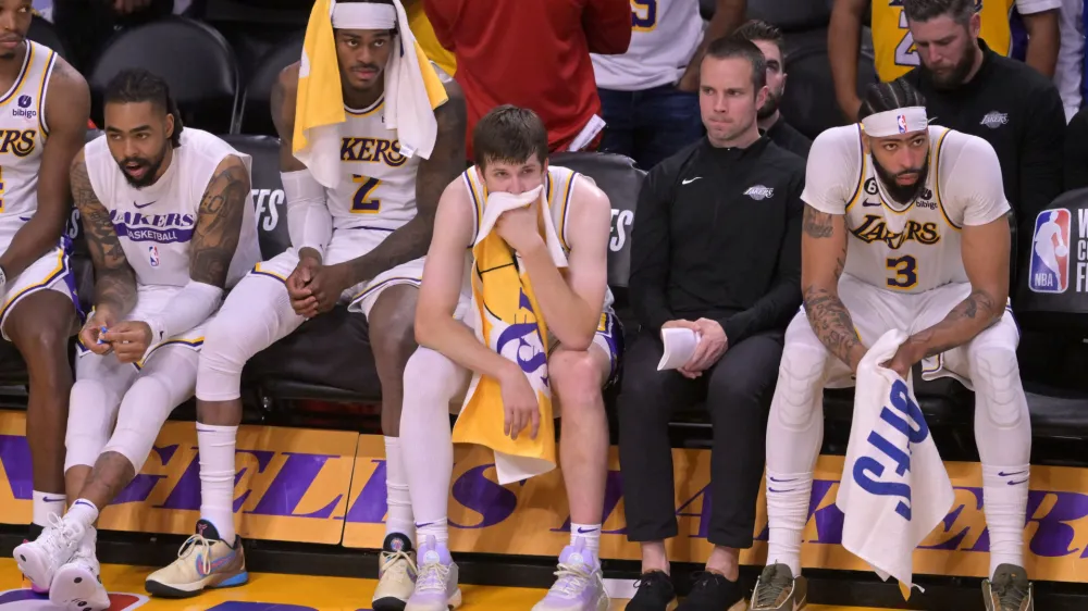 May 20, 2023; Los Angeles, California, USA; Los Angeles Lakers forward Jarred Vanderbilt (2) and guard Austin Reaves (15) and forward Anthony Davis (3) react in the fourth quarter against the Denver Nuggets during game three of the Western Conference Finals for the 2023 NBA playoffs at Crypto.com Arena. Mandatory Credit: Jayne Kamin-Oncea-USA TODAY Sports