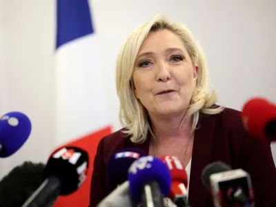 Marine Le Pen, French far-right National Rally (Rassemblement National) party candidate for the 2022 French presidential election, speaks during a news conference on democracy and the exercise of power in Vernon, France, April 12, 2022. REUTERS/Sarah Meyssonnier