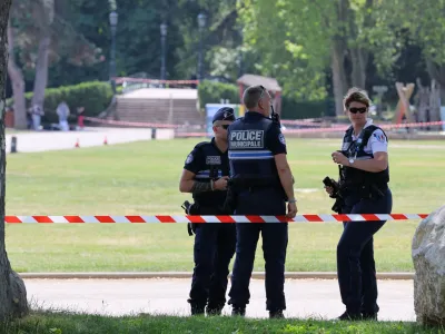 French police secure the area after several children and an adult have been injured in a knife attack in Annecy, in the French Alps, France, June 8, 2023. REUTERS/Denis Balibouse