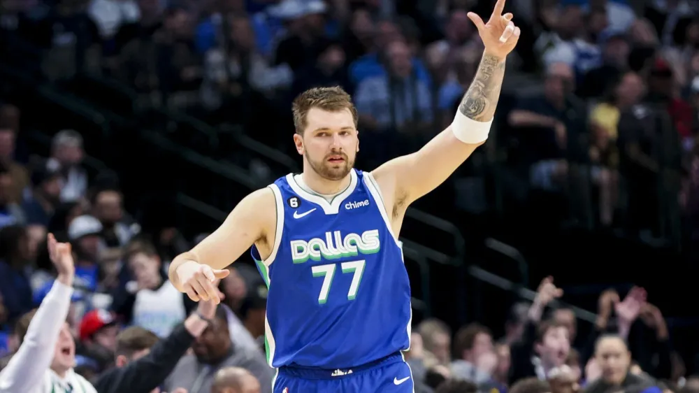 Mar 2, 2023; Dallas, Texas, USA; Dallas Mavericks guard Luka Doncic (77) reacts during the second half against the Philadelphia 76ers at American Airlines Center. Mandatory Credit: Kevin Jairaj-USA TODAY Sports