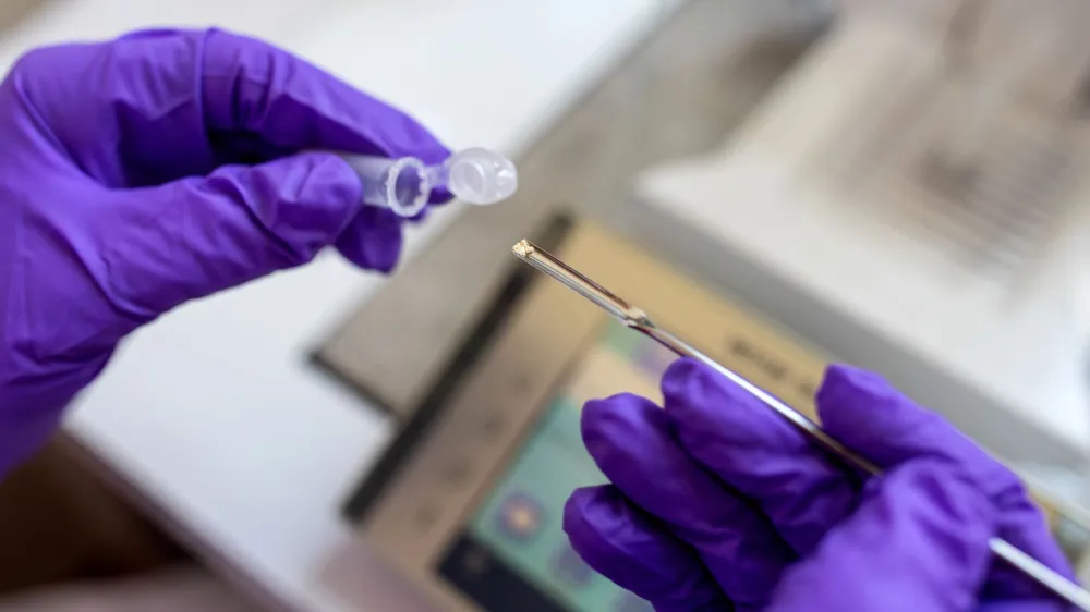 Martin Jasyk, scientific assistant at Berlin's forensic medicine department, holds a drug sample for purity testing in Berlin, Germany, July 10, 2023. Since the beginning of June people can hand in drug samples, anonymously and free of charge and have their composition tested as Berlin, popular for its club and techno scene, pioneers with this laboratory-based testing in Germany. REUTERS/Nadja Wohlleben