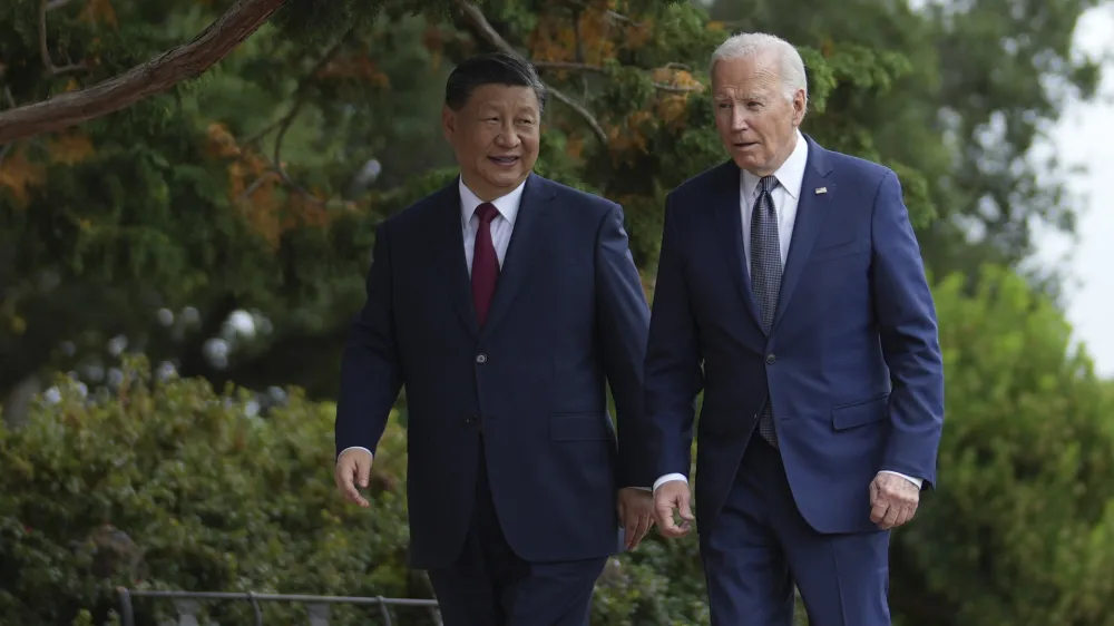 President Joe Biden and China's President President Xi Jinping walk in the gardens at the Filoli Estate in Woodside, Calif., Wednesday, Nov, 15, 2023, on the sidelines of the Asia-Pacific Economic Cooperative conference. (Doug Mills/The New York Times via AP, Pool)