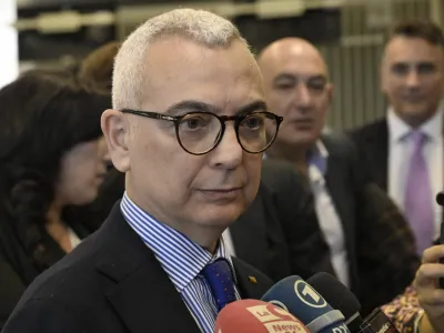 Vincenzo Capomolla, deputy prosecutor of Catanzaro, talks to reporters at the end of the reading of the verdicts of a maxi-trial of hundreds of people accused of membership in Italy's 'ndrangheta organized crime syndicate, one of the world's most powerful, extensive and wealthy drug-trafficking groups, in Lamezia Terme, southern Italy, Monday, Nov. 20, 2023. Verdicts are expected Monday for the trial that started almost three years ago in the southern Calabria region, where the mob organization was originally based. (AP Photo/Valeria Ferraro)