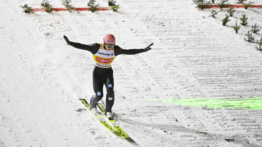 ﻿Karl Geiger of Germany in action, during the men's ski jumping FIS World Cup at the Titlisschanze, in Engelberg, Switzerland, Sunday, Dec. 19, 2021. (Gian Ehrenzeller/Keystone via AP)