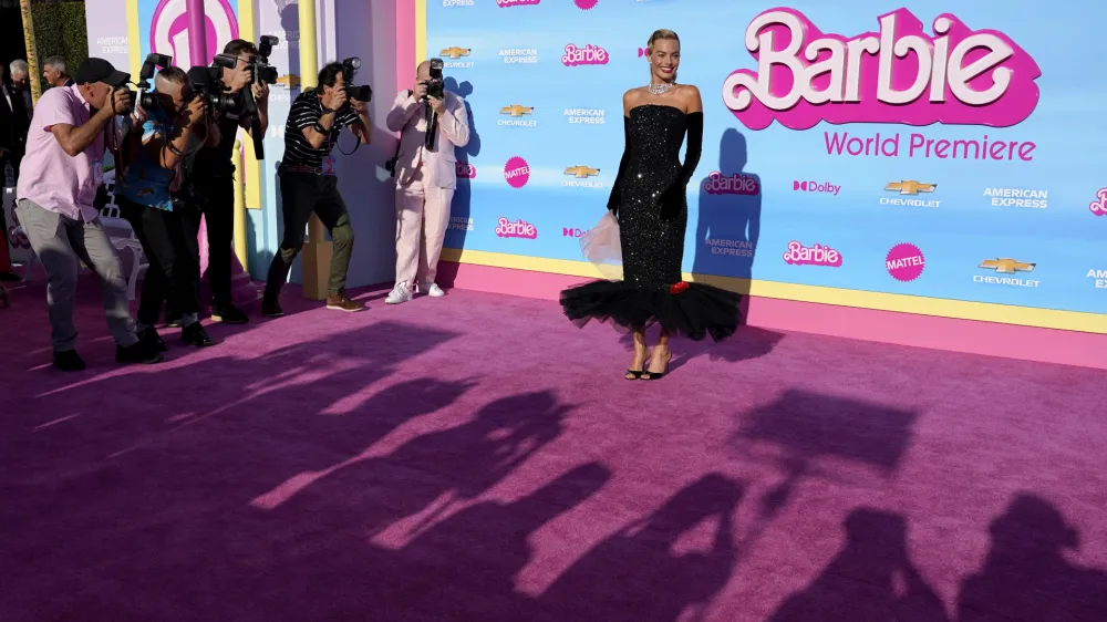 Margot Robbie arrives at the premiere of "Barbie" on Sunday, July 9, 2023, at The Shrine Auditorium in Los Angeles. (AP Photo/Chris Pizzello)