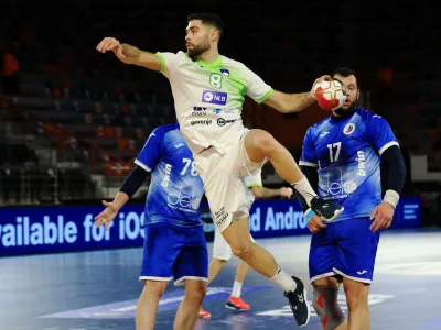 ﻿Handball - 2021 IHF Handball World Championship - Preliminary Round Group H - Russia v Slovenia - Handball Hall Borg Al Arab, Alexandria, Egypt - January 16, 2021 Slovenia's Blaz Janc in action IHF/Handout via REUTERS/Hazem_gouda NO ARCHIVES. THIS IMAGE HAS BEEN SUPPLIED BY A THIRD PARTY. IT IS DISTRIBUTED, EXACTLY AS RECEIVED BY REUTERS, AS A SERVICE TO CLIENTS.