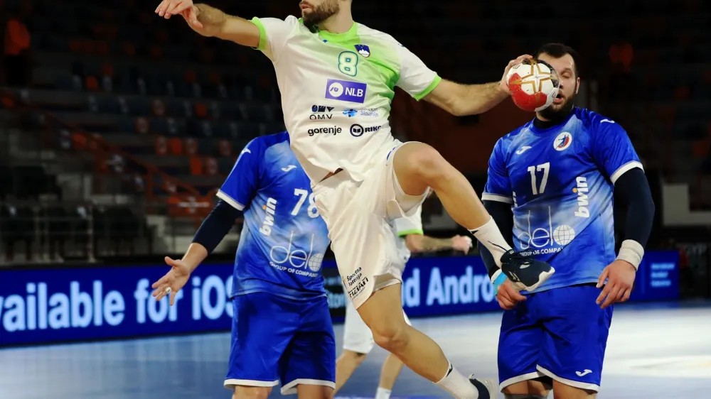 ﻿Handball - 2021 IHF Handball World Championship - Preliminary Round Group H - Russia v Slovenia - Handball Hall Borg Al Arab, Alexandria, Egypt - January 16, 2021 Slovenia's Blaz Janc in action IHF/Handout via REUTERS/Hazem_gouda NO ARCHIVES. THIS IMAGE HAS BEEN SUPPLIED BY A THIRD PARTY. IT IS DISTRIBUTED, EXACTLY AS RECEIVED BY REUTERS, AS A SERVICE TO CLIENTS.