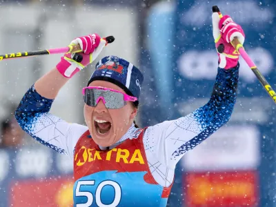 ﻿Kerttu Niskanen of Finland, the winner, reacts in the finish area after the women's 10 km classic race at the FIS Tour de Ski in Lenzerheide, Switzerland, Wednesday, Dec. 29, 2021. (Peter Schneider/Keystone via AP)