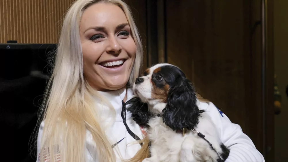 ﻿United States alpine skier Lindsey Vonn holds her dog Lucy after a press conference at the 2018 Winter Olympics in Pyeongchang, South Korea, Friday, Feb. 9, 2018. (AP Photo/J. David Ake)