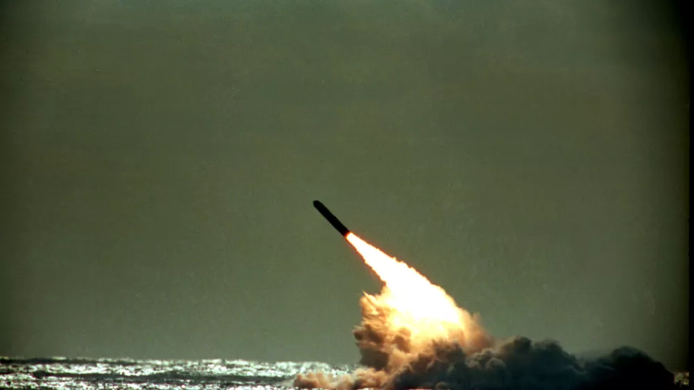 FILE - The Dec. 4, 1989 file photo shows U.S. Navy launching a Trident II, D-5 missile from the submerged submarine USS Tennessee in the Atlantic Ocean off the coast of Florida. Pushing his vision of a nuclear weapons-free world, President Barack Obama returned to Prague on Thursday, April 8, 2010 to sign a pivotal treaty aimed at sharply paring U.S. and Russian arsenals ? and repairing soured relations between the nations. With that, they will commit their nations to slash the number of strategic nuclear warheads by one-third and more than halve the number of missiles, submarines and bombers carrying them, pending ratification by their legislatures. The new treaty will shrink those warheads to 1,550 over seven years. That still allows for mutual destruction several times over. But it will send a strong signal that Russia and the U.S., which between them own more than 90 percent of the world's nuclear weapons, are serious about disarmament. (AP Photo/Phil Sandlin, File)