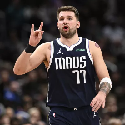 Dallas Mavericks guard Luka Doncic (77) gestures during the second half of an NBA basketball game against the Washington Wizards, Thursday, Dec. 5, 2024, in Washington. The Mavericks won 137-101. (AP Photo/Nick Wass)