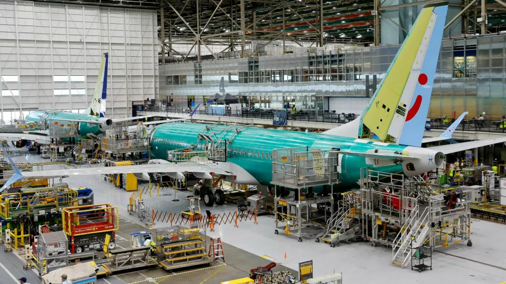 FILE PHOTO: Boeing 737 MAX aircraft are assembled at the company's plant in Renton, Washington, U.S. June 25, 2024. Jennifer Buchanan/Pool via REUTERS/File Photo