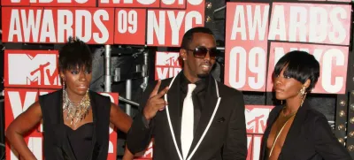 2X88K2R Sean "P. Diddy" Combs with Kalenna Harper and Dawn Richard of Dirty Money arriving at The 2009 MTV Video Music Awards at Radio City Music Hall in New York City on September 13, 2009. Photo Credit: Henry McGee/MediaPunch