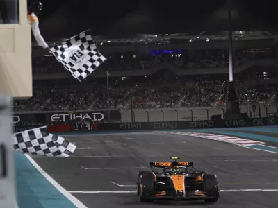 McLaren driver Lando Norris of Britain wins the Formula One Abu Dhabi Grand Prix at the Yas Marina Circuit in Abu Dhabi, UAE, Sunday, Dec. 8, 2024. (AP Photo/Hamad I Mohammed, Pool)