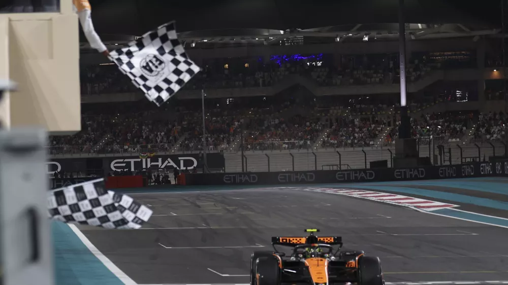 McLaren driver Lando Norris of Britain wins the Formula One Abu Dhabi Grand Prix at the Yas Marina Circuit in Abu Dhabi, UAE, Sunday, Dec. 8, 2024. (AP Photo/Hamad I Mohammed, Pool)