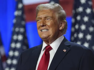 FILE - Republican presidential nominee former President Donald Trump smiles at an election night watch party at the Palm Beach Convention Center, Nov. 6, 2024, in West Palm Beach, Fla. (AP Photo/Evan Vucci, File)