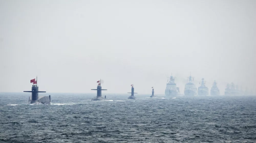 ﻿Chinese Navy submarines and warships take part in an international fleet review to celebrate the 60th anniversary of the founding of the People's Liberation Army Navy in Qingdao, Shandong province, in this April 23, 2009 file photo. To match Special Report BREAKOUT-SUBMARINES/   REUTERS/Guang Niu/Pool/Files (CHINA - Tags: MILITARY POLITICS ANNIVERSARY)