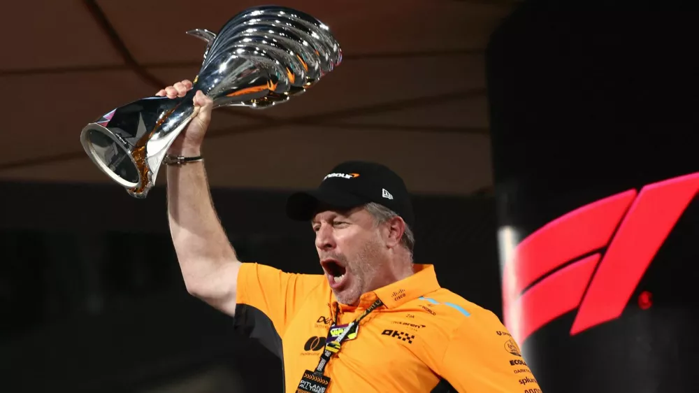 Formula One F1 - Abu Dhabi Grand Prix - Yas Marina Circuit, Abu Dhabi, United Arab Emirates - December 8, 2024 McLaren chief executive Zak Brown celebrates with a trophy after McLaren's Lando Norris wins the Abu Dhabi Grand Prix REUTERS/Jakub Porzycki