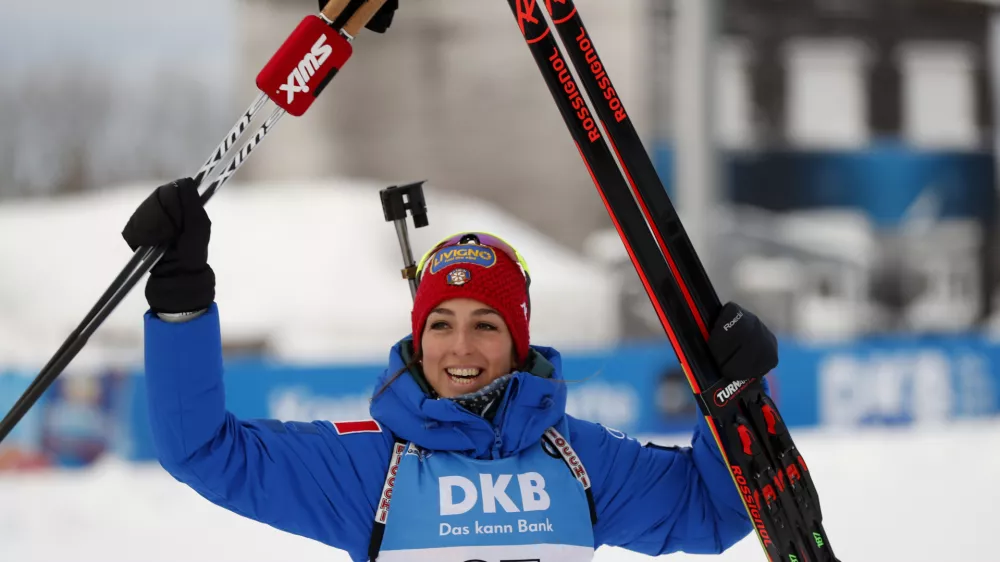 ﻿Italy's Lisa Vittozzi jubilates after taking first place in the women's Biathlon World Cup 7.5 km sprint event in Oberhof, Germany, Thursday, Jan. 10, 2019. (AP Photo/Petr David Josek)