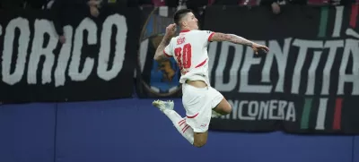 Leipzig's Benjamin Sesko celebrates after he scored during the UEFA Champions League opening phase soccer match between Leipzig and Juventus in Leipzig, Germany, Wednesday, Oct. 2, 2024.(AP Photo/Ebrahim Noroozi)